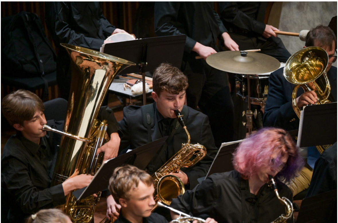 Nathaniel performing in a full orchestra ensemble
